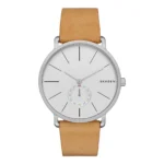Silver Skagen watch with a minimalist white face, thin hour markers, and a light brown leather strap.
