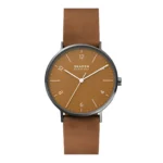 A Skagen Denmark watch featuring a brown dial, minimalist white hour markers, and a matching brown leather strap.