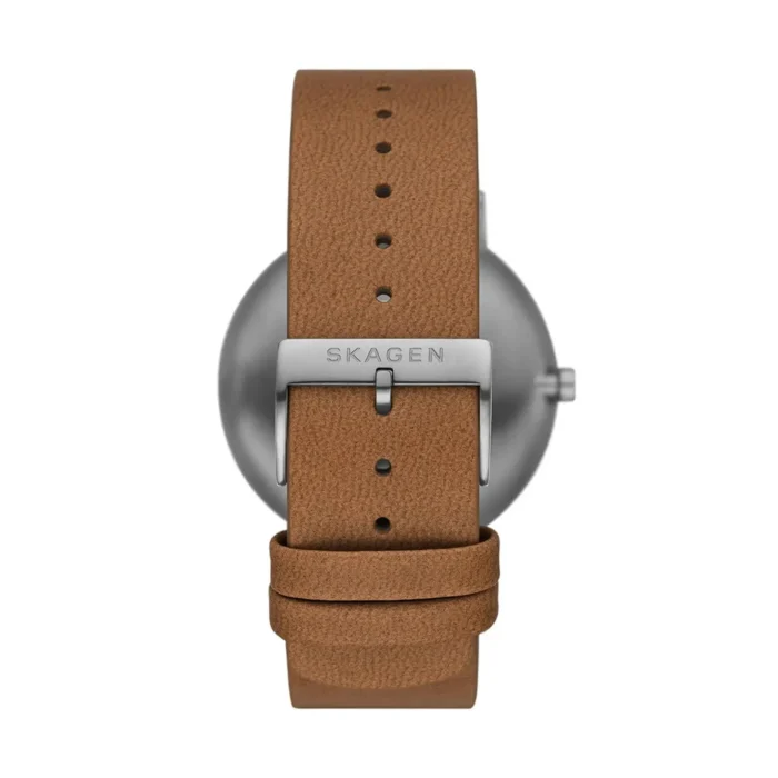Close-up of a Skagen watch featuring a sleek metal case and a tan leather strap with buckle detail.