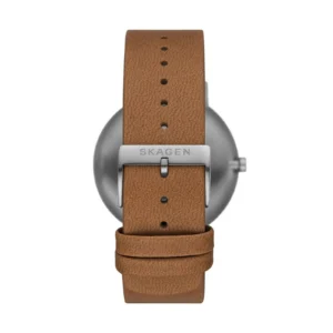 Close-up of a Skagen watch featuring a sleek metal case and a tan leather strap with buckle detail.