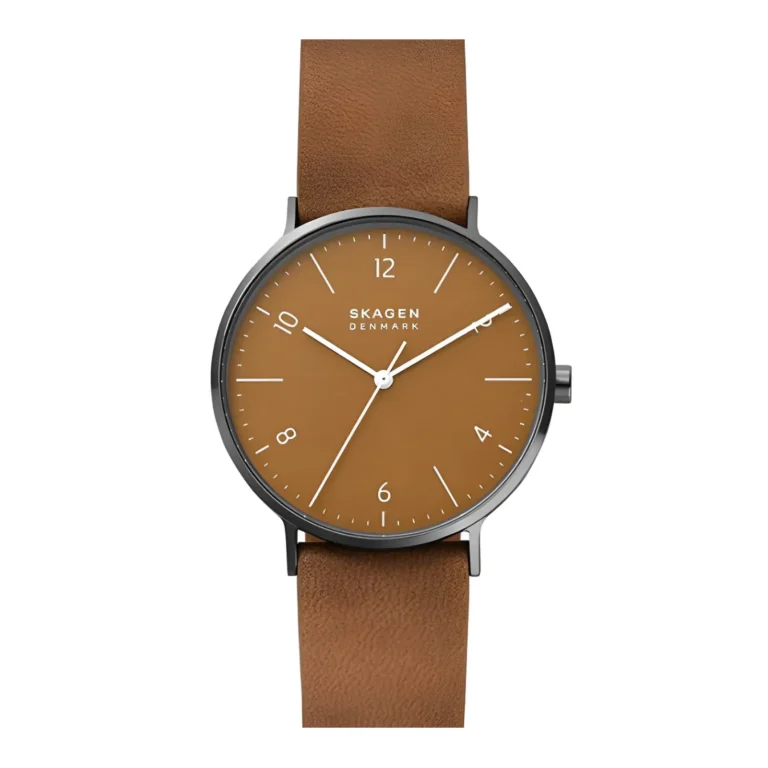 A Skagen Denmark watch featuring a brown dial, minimalist white hour markers, and a matching brown leather strap.
