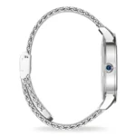 Elegant silver watch with a chain-link bracelet, featuring a blue gemstone at the crown, shown from a side angle.