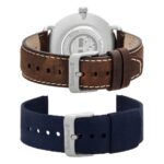 A Timberland watch with a brown leather strap above and a navy fabric strap below, showcasing interchangeable styles.
