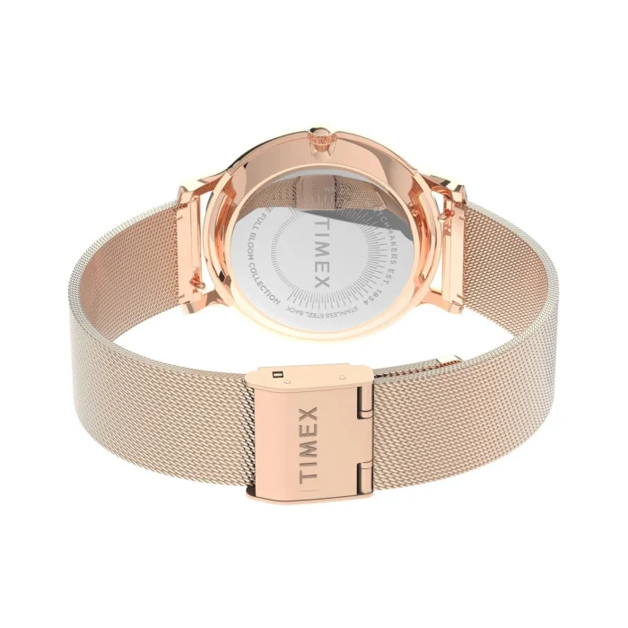 Close-up view of a Timex watch featuring a rose gold mesh band and rear casing with brand details visible.