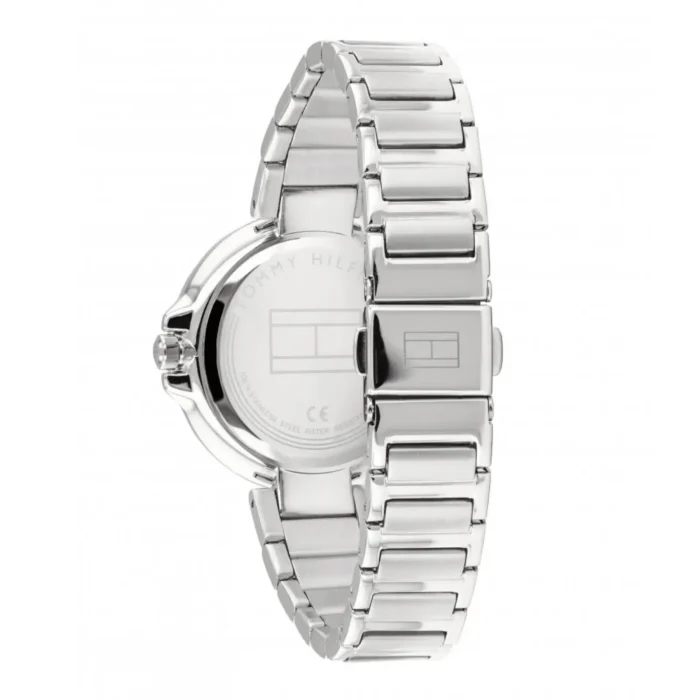 A side view of a silver stainless steel Tommy Hilfiger watch with a polished bracelet and minimalist round face design.