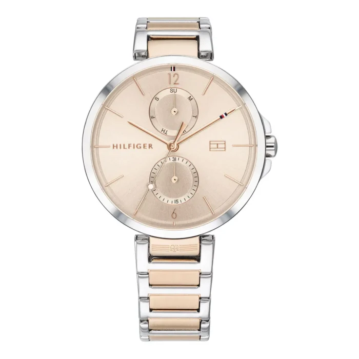 Sleek Tommy Hilfiger watch with a gold-toned dial, dual sub-dials, and a silver and rose gold metal bracelet. Elegant timepiece design.