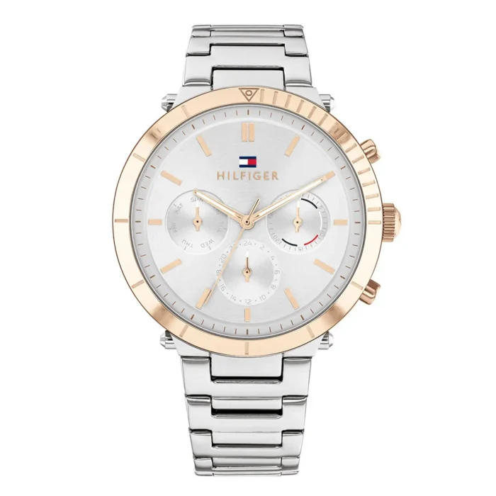 A stylish Tommy Hilfiger watch featuring a silver dial, rose gold accents, and a silver metal bracelet.