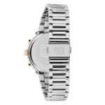 Tommy Hilfiger silver stainless steel watch with gold accents, showcasing a minimalist dial and sleek link bracelet.