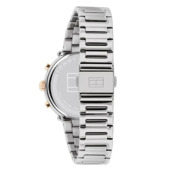 Tommy Hilfiger silver stainless steel watch with gold accents, showcasing a minimalist dial and sleek link bracelet.
