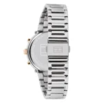 Tommy Hilfiger sidabrinis nerūdijančio plieno laikrodis su aukso akcentais, minimalistiniu ciferblatu ir elegantiška apyranke.
