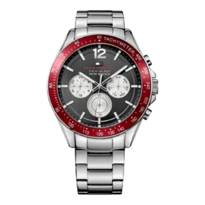 Tommy Hilfiger men's watch with silver stainless steel band, black dial, red tachymeter bezel, and three subdials for timekeeping.