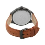 Back view of a stylish watch featuring a black case, brown leather strap, and water resistance markings on the case back.