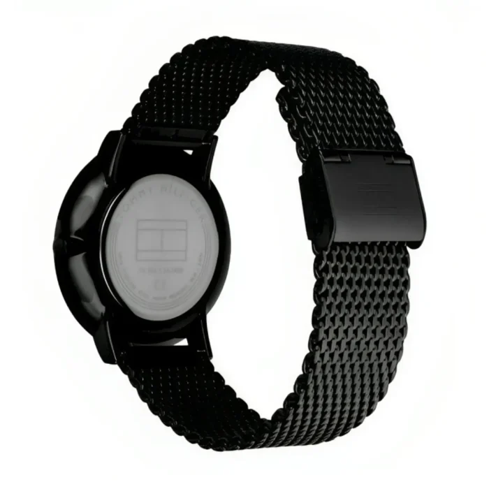 Black Tommy Hilfiger watch featuring a mesh strap and a round case, showcasing the brand logo on the back.