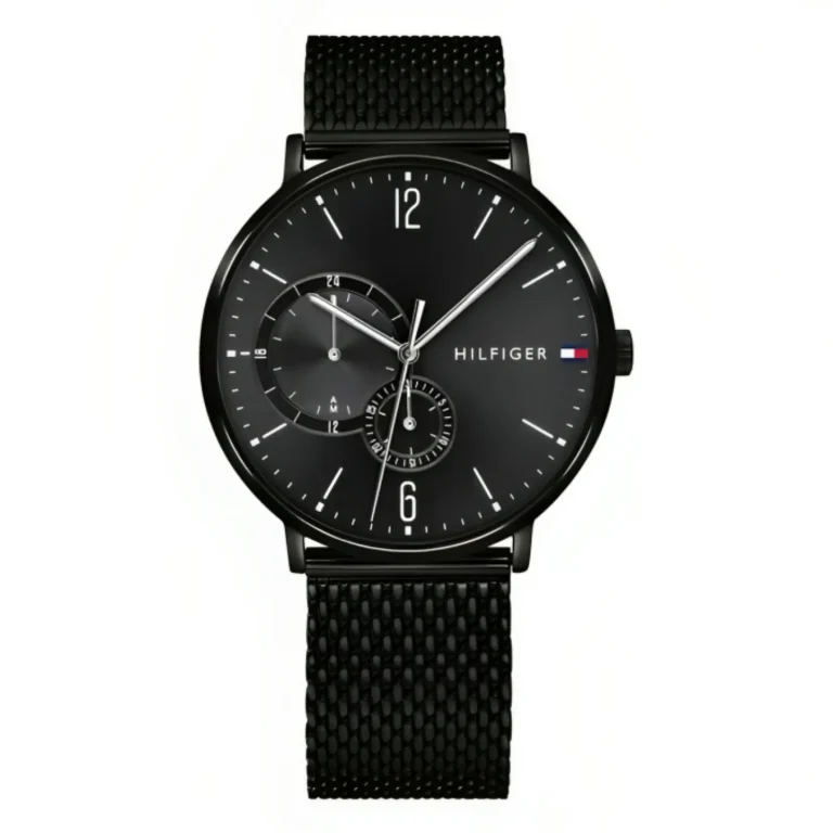 Black, round Tommy Hilfiger watch featuring a sleek design, white hour markers, and a textured black mesh strap.