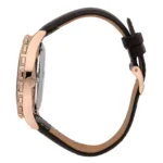 Side view of a stylish rose gold watch with a black leather strap, showcasing its elegant design and intricate details.