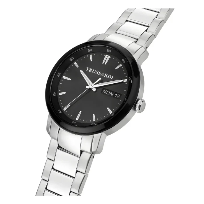 Silver metal wristwatch with a black dial, Trussardi branding, date display, and sleek polished bracelet.